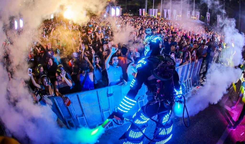A robot man performing in front of a crowd